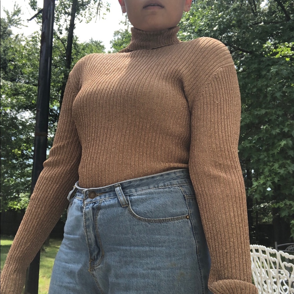 Golden turtleneck